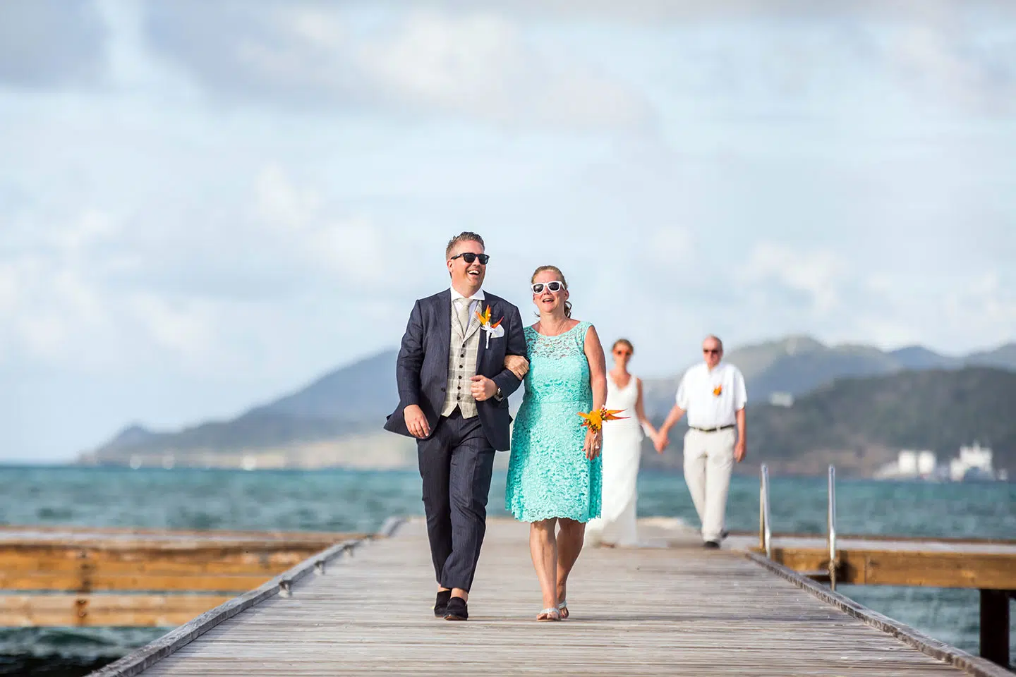 Groom and mother during their wedding in the Caribbean