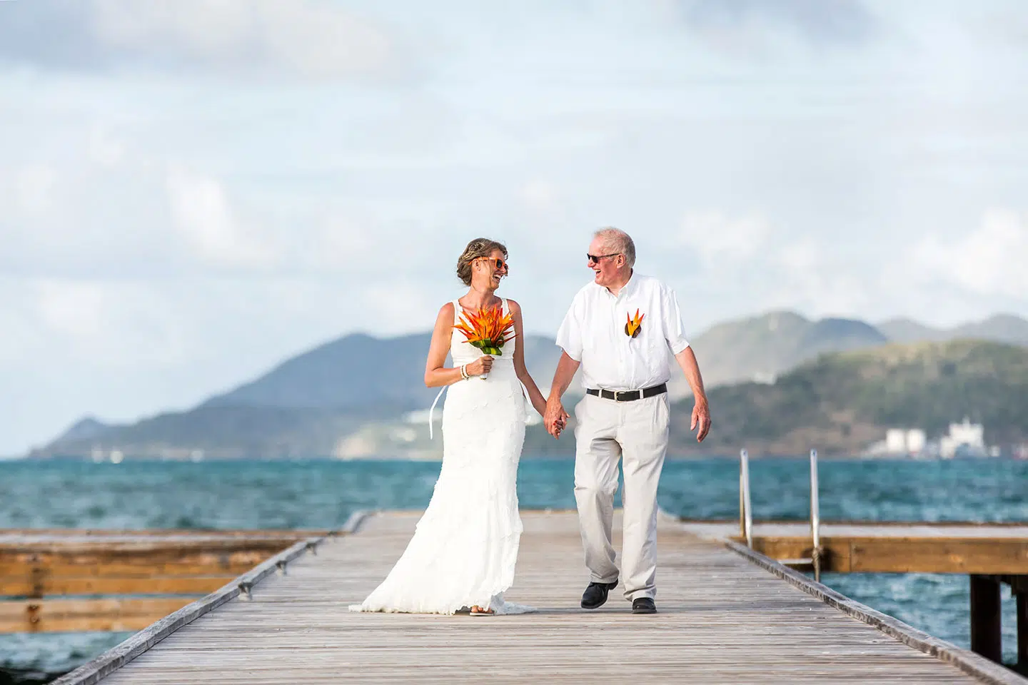 Bride and father during wedding ceremony in the Caribbean