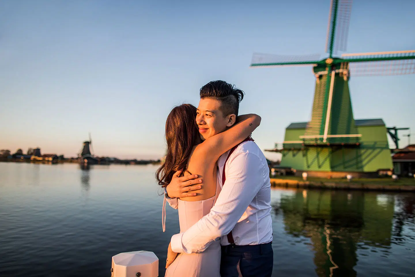 Pre-wedding shoot at the windmill village of Zaanse Schans at sunset