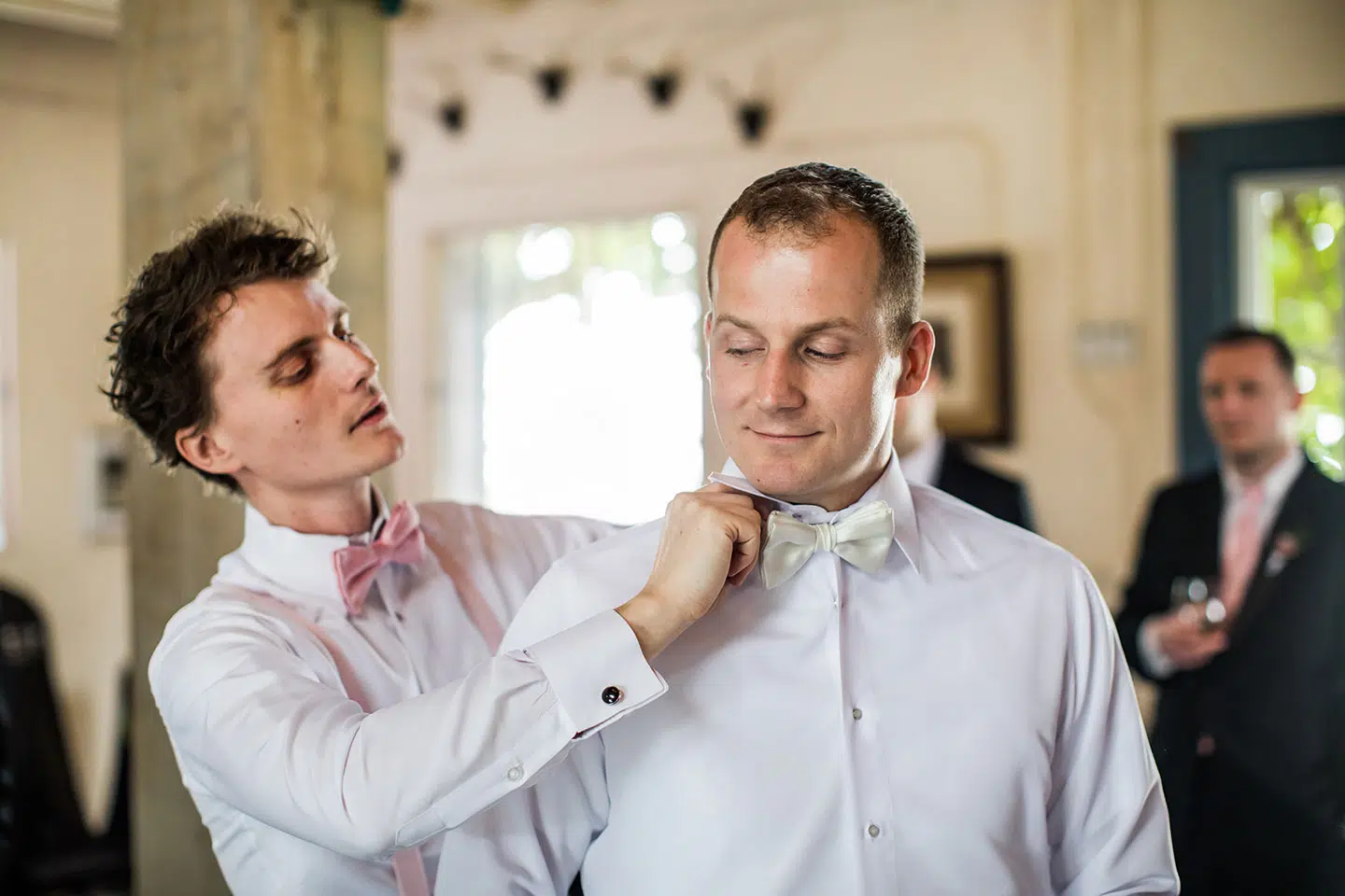 Groom getting ready for his wedding at Historic Walton House in Florida