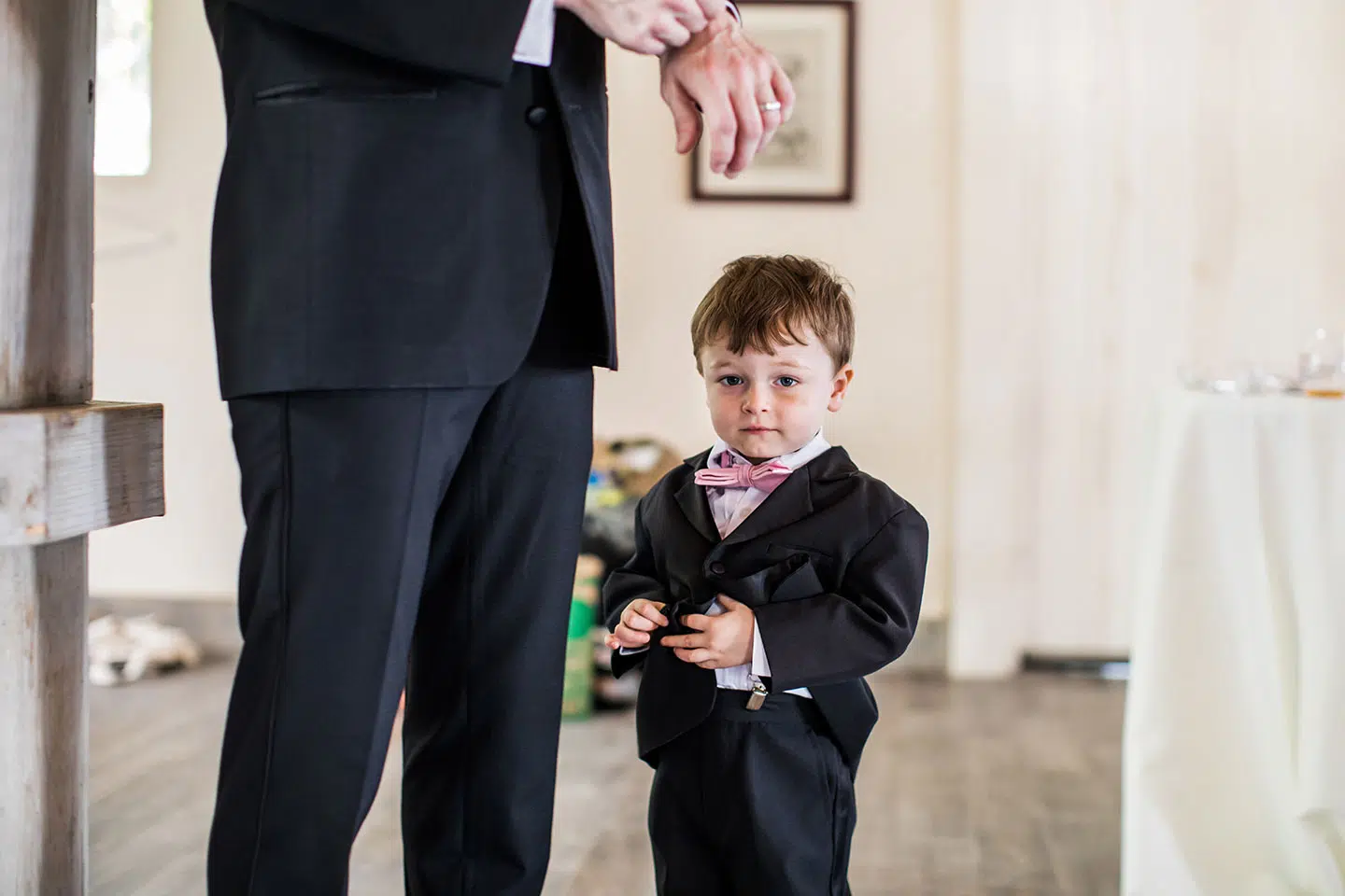 Little groomsman in a suit