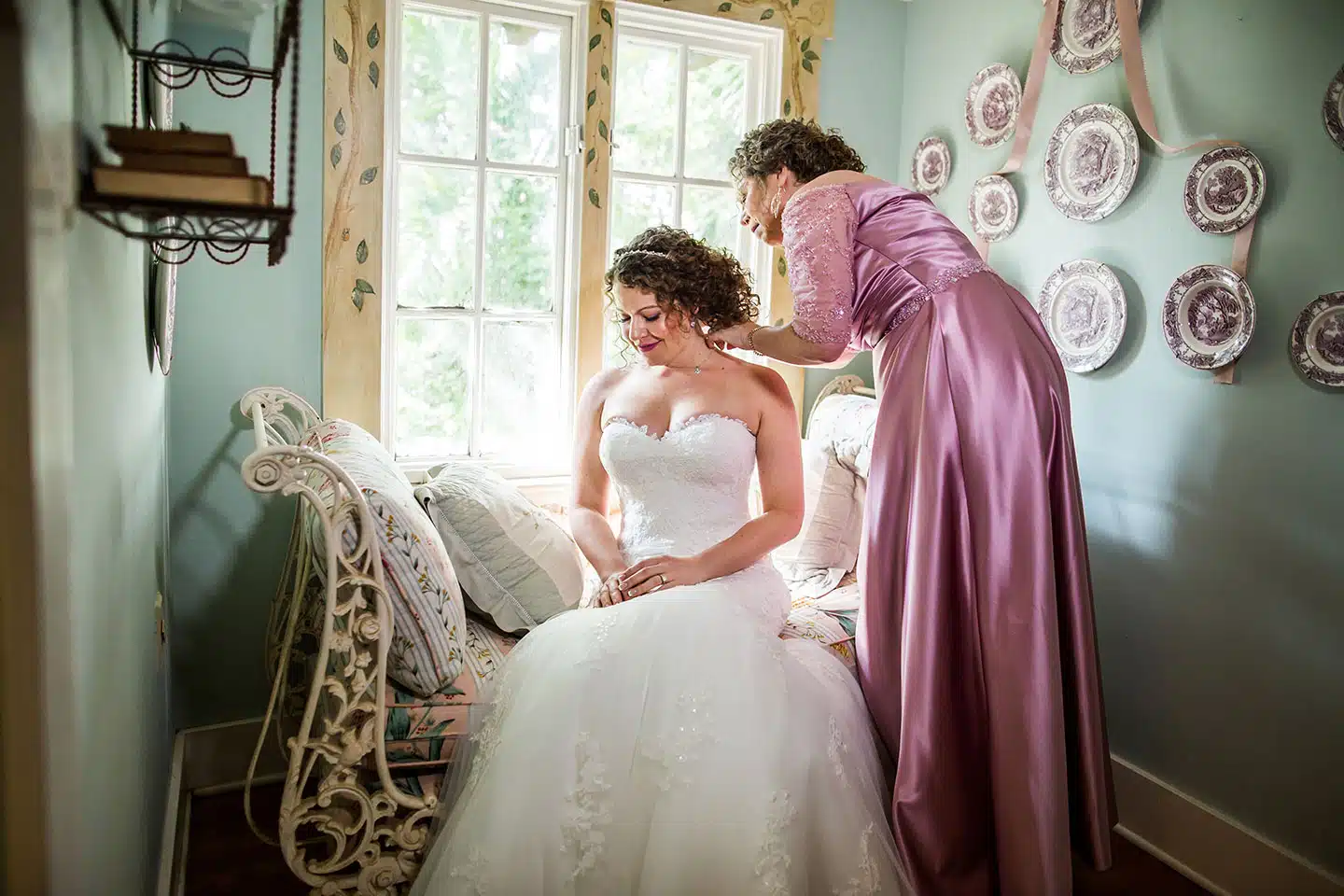 Bride with her mother during a wedding at Historic Walton House in Homestead, Florida